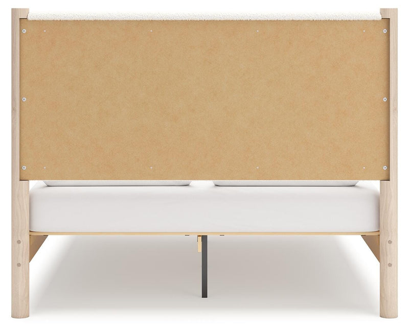 Cadmori Queen Upholstered Panel Bed with Mirrored Dresser