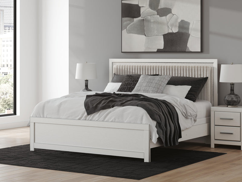 Zuraleus King Upholstered Panel Bed, Dresser, Mirror, Chest and Nightstand