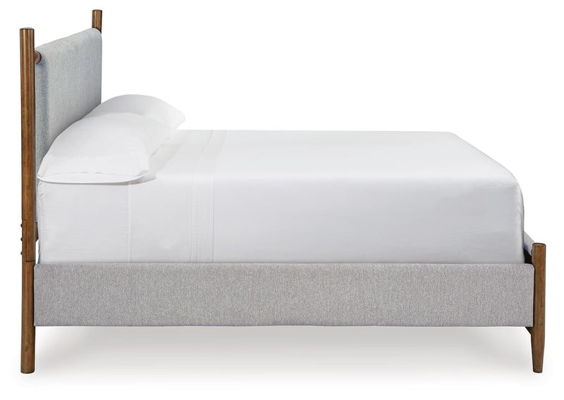 Lyncott California King Upholstered Bed with Mirrored Dresser